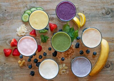 Assorted fruit smoothies with fresh fruit